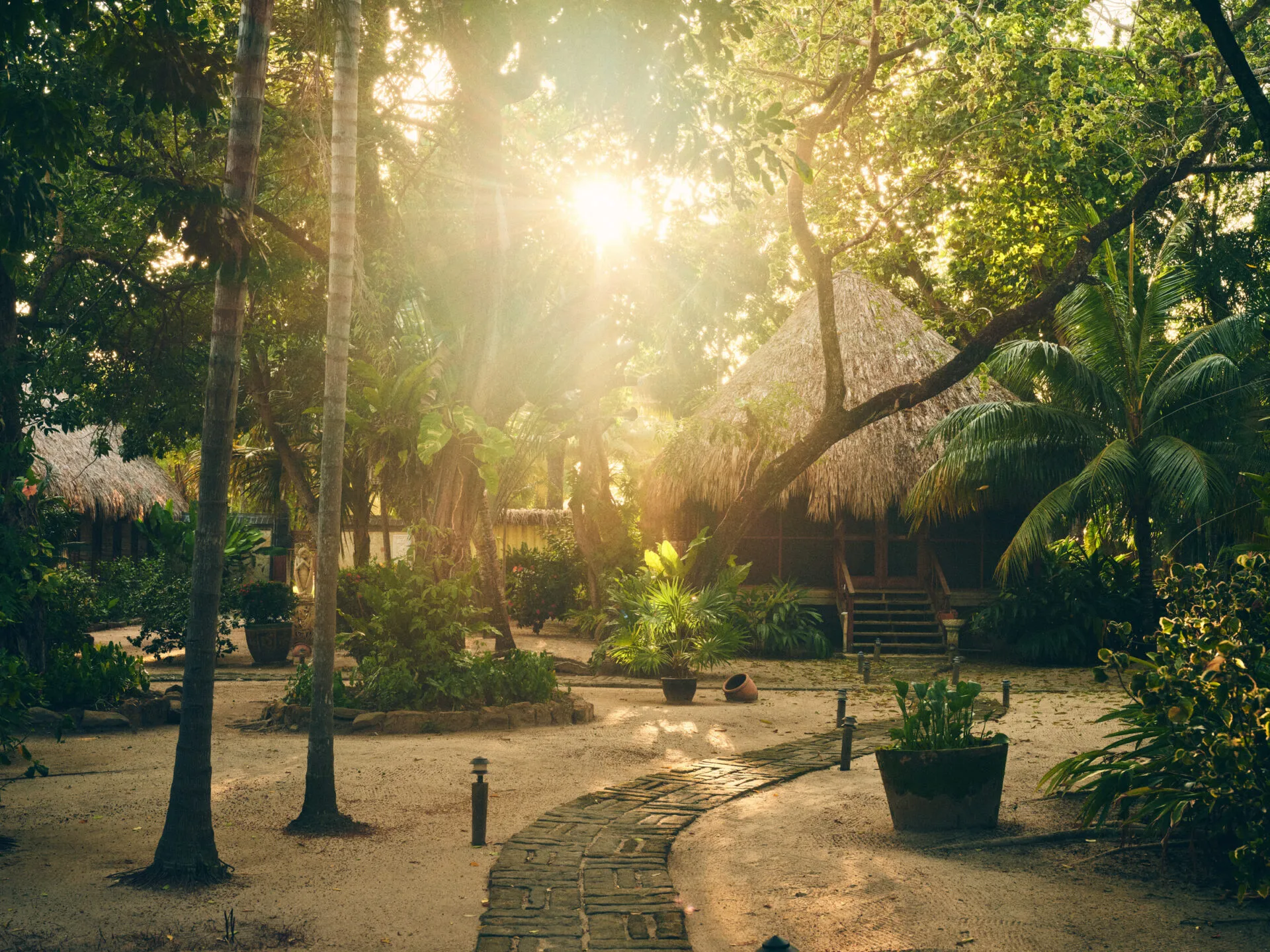 the path to a Garden View Cottage at Turtle Inn, Belize