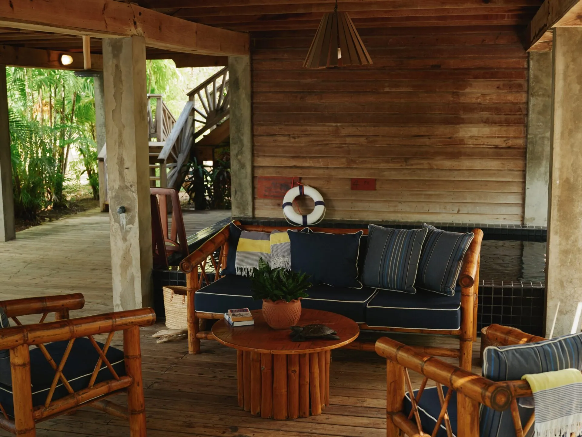 Roman's Lagoon Bungalow outdoor deck at Turtle Inn in Placencia Belize