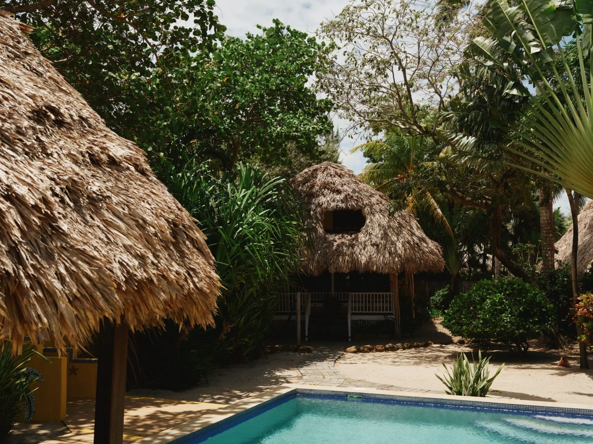 exterior of starfish cottage at turtle inn in placencia belize, a coppola hideaway