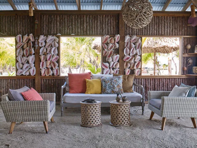 A lounge area with comfortable chairs and a couch