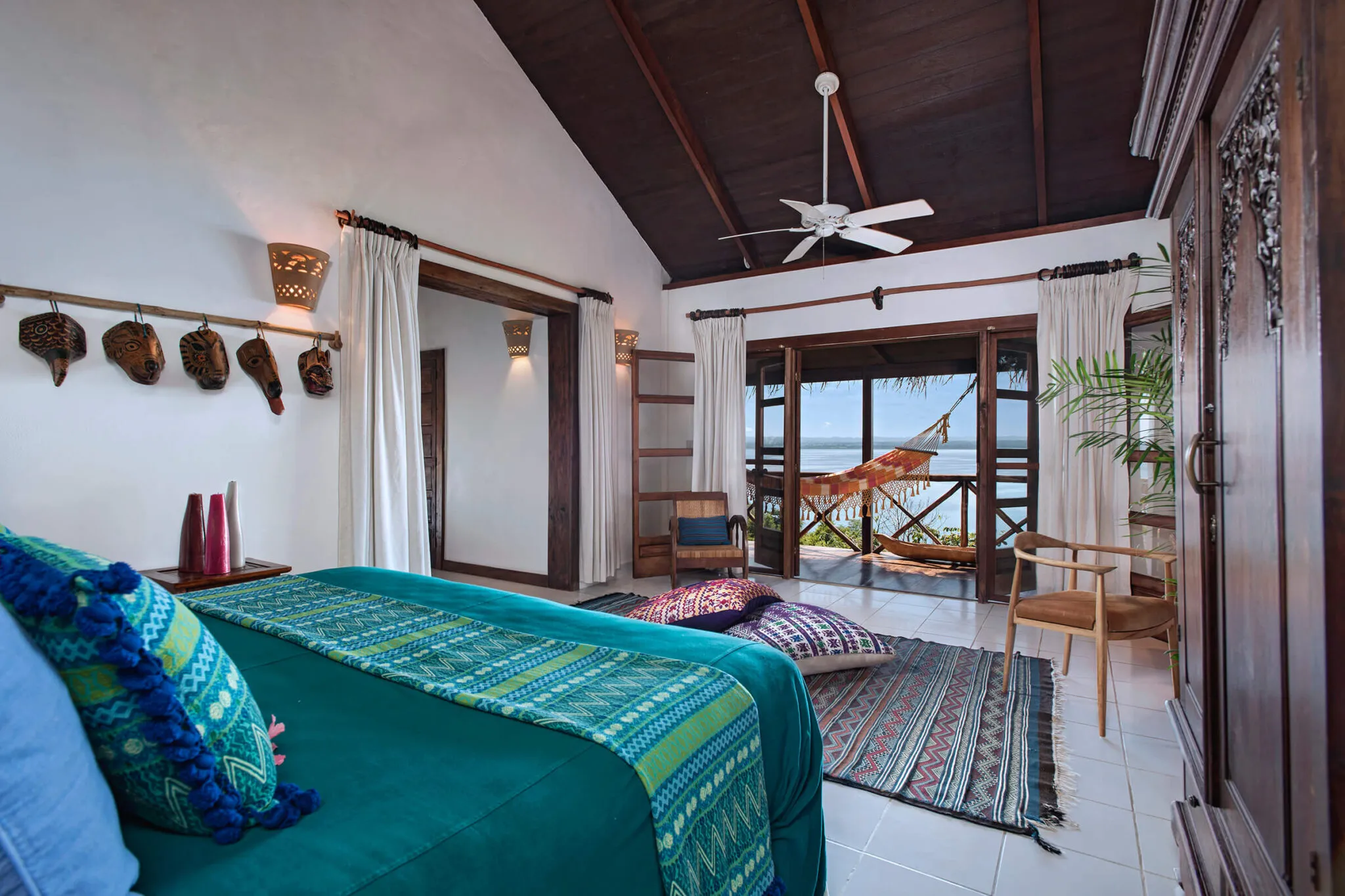 A view of the blue bed in the Lakeview Suite at La Lancha.
