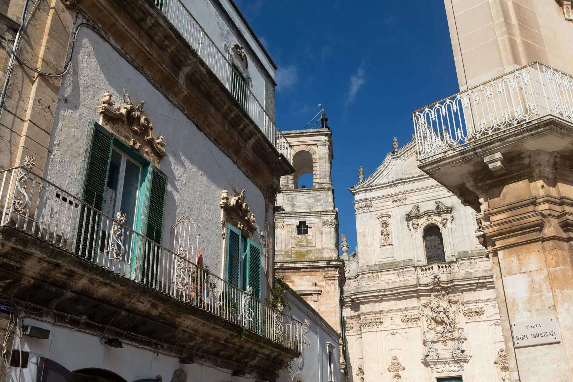 Balconies with a church in the background