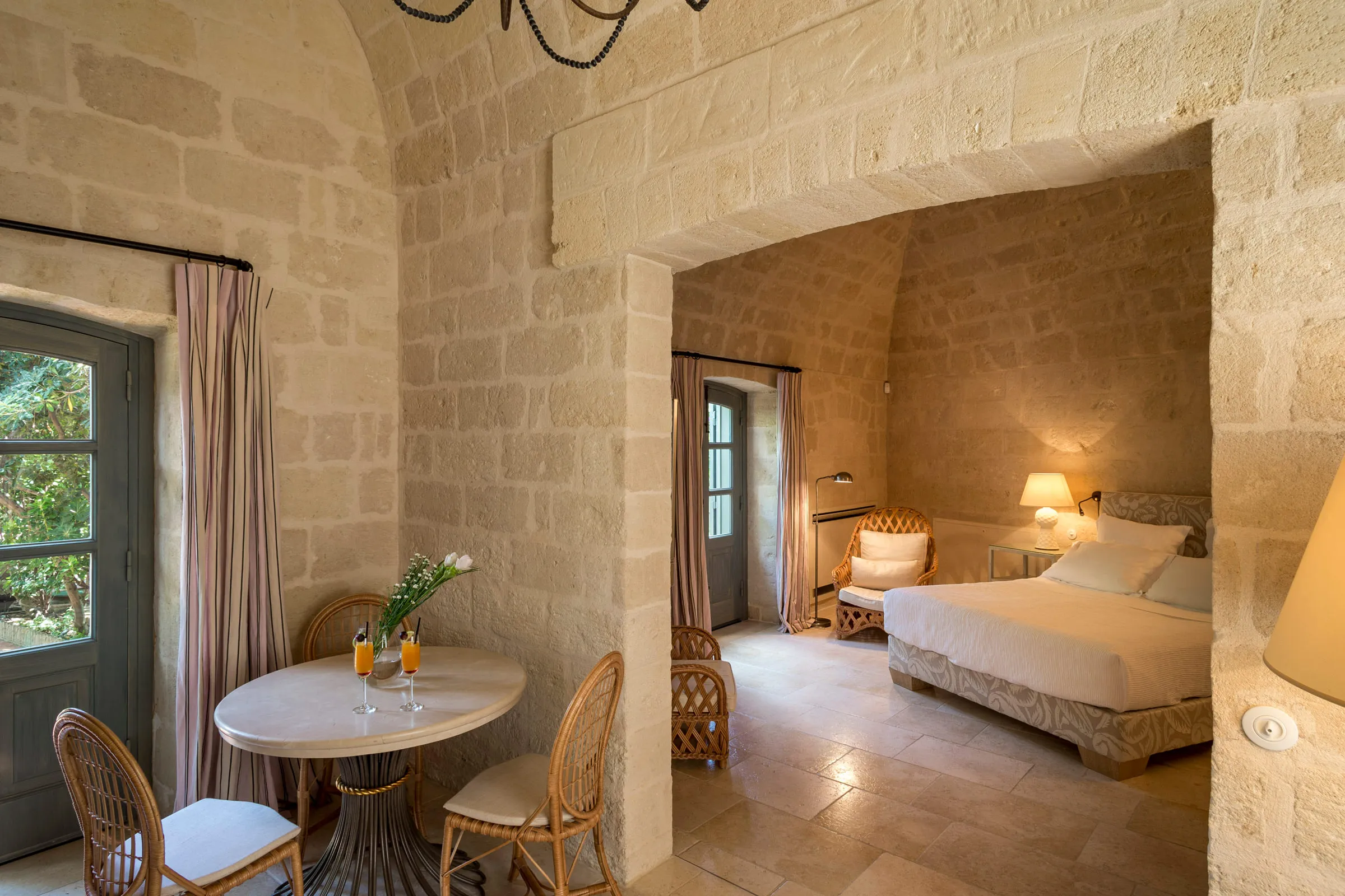 Bedroom suite with stone walls