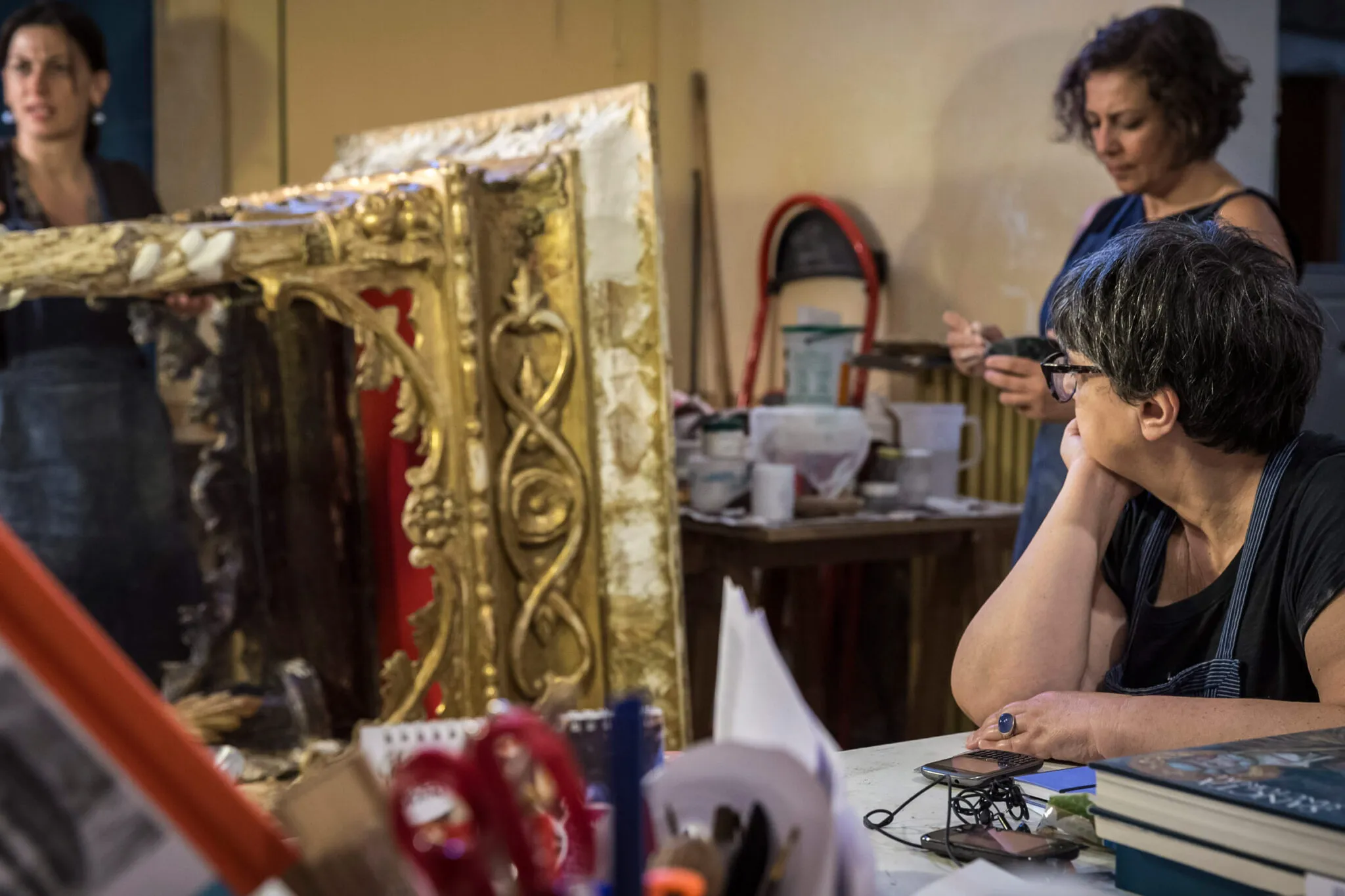 art restorers at work in their studio