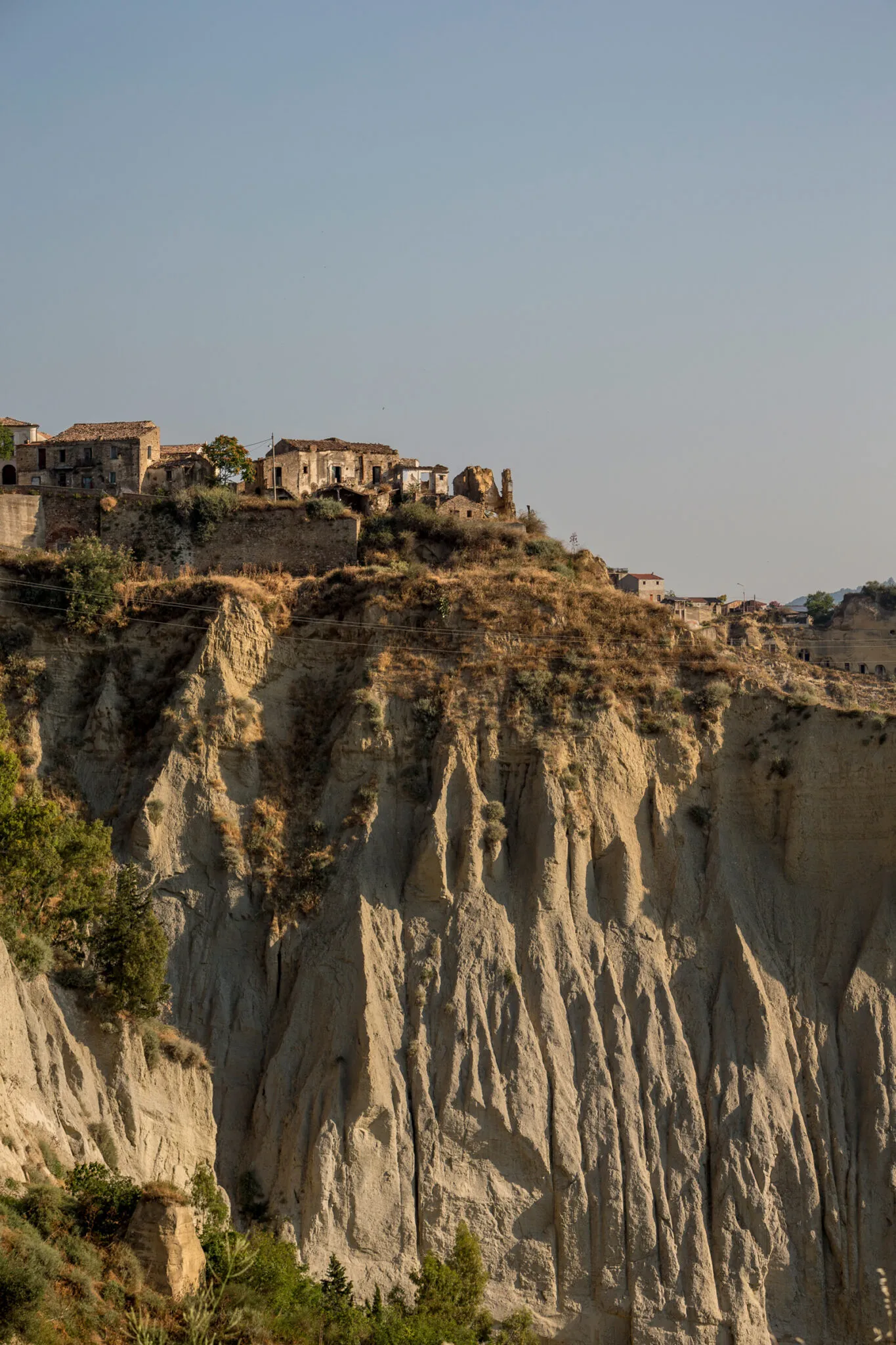 Buildings on a steep, rocky hill