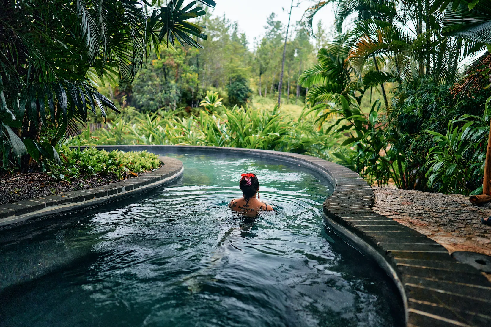 A woman relaxing in a pool
